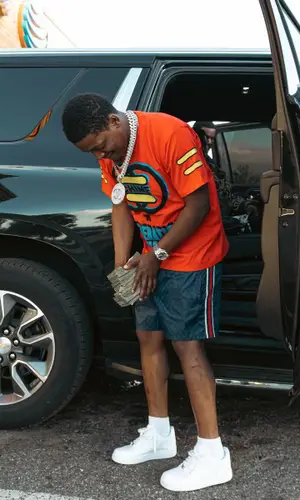 Baby Money wearing Gucci t-shirt
