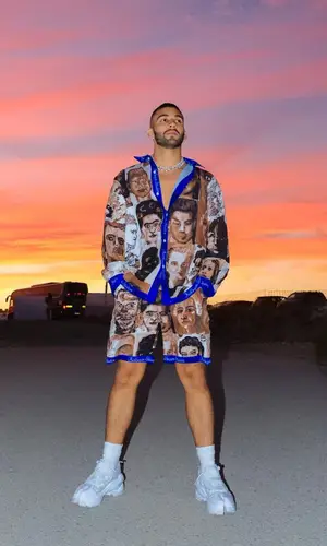 Manuel Turizo’s Outfit in KidSuper Shirt, Maison Margiela Sneakers & Reebok (2022)