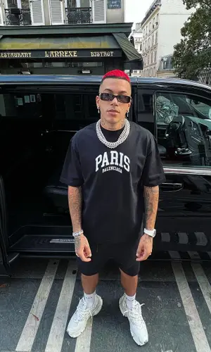 Sfera Ebbasta wearing Balenciaga sock