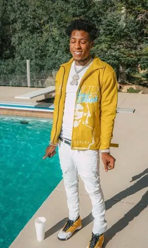 NBA YoungBoy wearing Amilli Atelier jacket