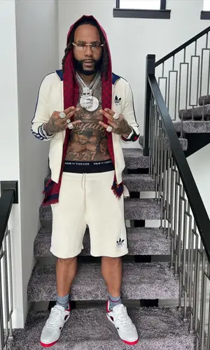 Money Man wearing Gucci shorts