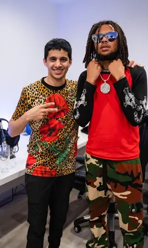 SeptembersRich wearing Chrome Hearts pants
