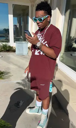 Lil Gotit wearing Dior eyewear