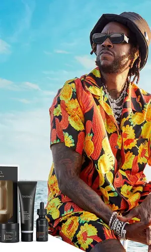 2 Chainz wearing Loewe shirt