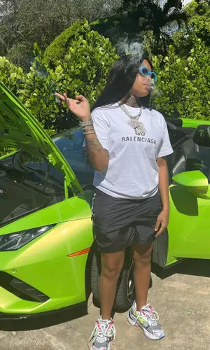 Desto wearing Balenciaga t-shirt