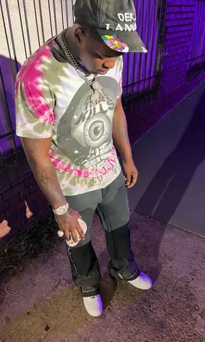 Lil Zay Osama wearing Gallery Dept. t-shirt