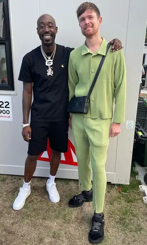 Freddie Gibbs wearing Carhartt t-shirt