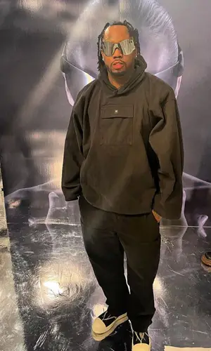 Fivio Foreign wearing Yeezy hoody