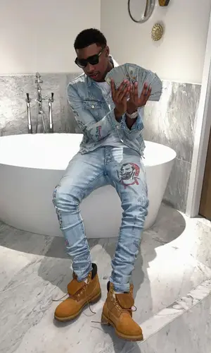 Rob49 wearing Timberland boots