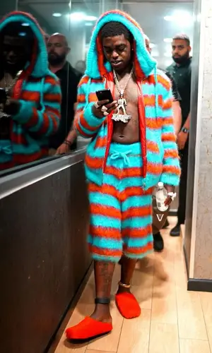 Kodak Black wearing Marni shorts