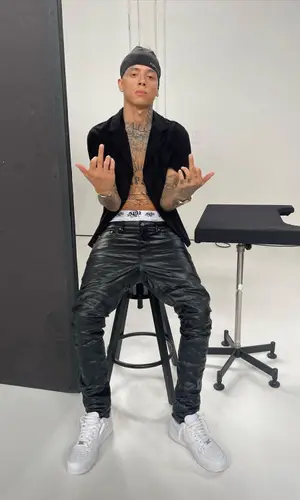 Central Cee wearing Purple Brand jeans