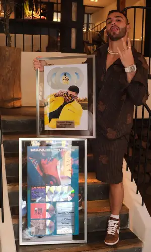 Manuel Turizo’s Outfit in Todd Patrick Shirt & Nike Sneakers (2022)