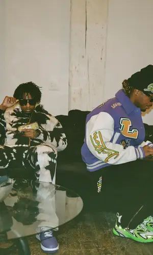 21 Savage wearing Louis Vuitton pants