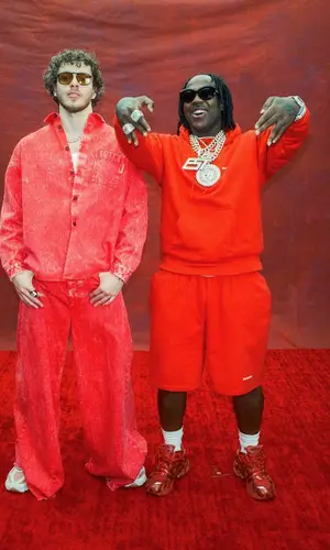 EST Gee wearing Balenciaga shorts