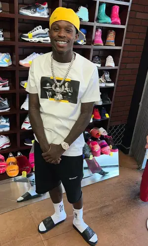 Quando Rondo wearing Off-White shorts