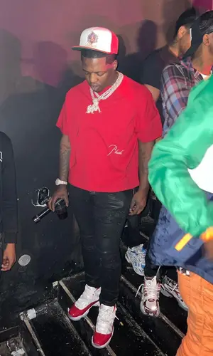 Lil Zay Osama’s Outfit in Amiri Jeans, Jordan Sneakers & Rhude Cap (2022)