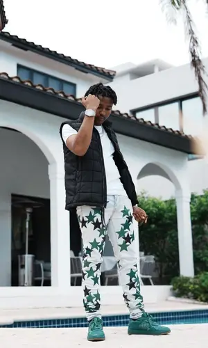 Lil Pj wearing Amiri jeans