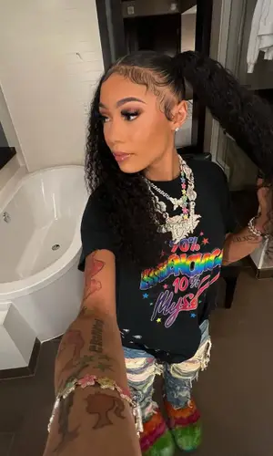 Coi Leray’s Outfit in Balenciaga T-Shirt, Who Decides War Jeans & Marni Sandals (2022)