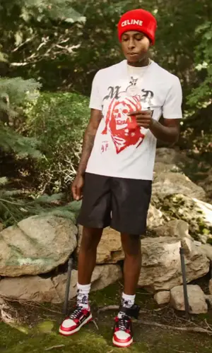 NBA YoungBoy wearing Amiri t-shirt