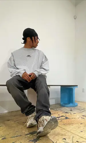 Boslen wearing Balenciaga jeans