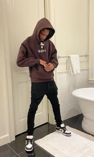 Duwap Kaine wearing Supreme sneakers