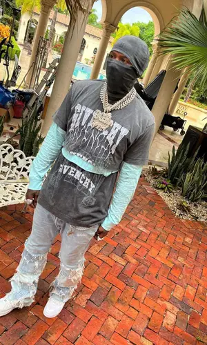 Moneybagg Yo wearing Givenchy t-shirt