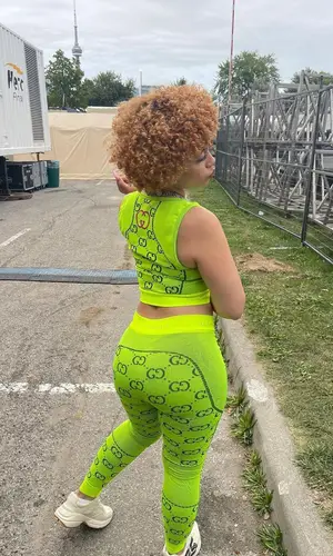 Ice Spice wearing Gucci sneakers