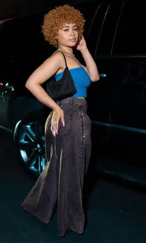 Ice Spice wearing Chanel jeans