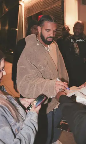 Drake wearing Louis Vuitton sneakers