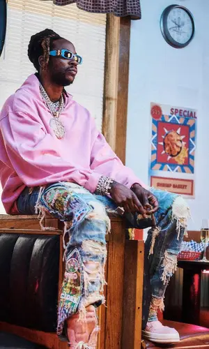 2 Chainz’s Outfit in Who Decides War Jeans, Rick Owens Sneakers & Balenciaga Eyewear (2022)