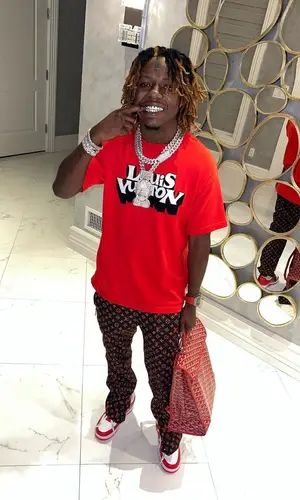 Jackboy wearing Goyard backpack