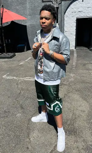 Lil Gotit wearing Gallery Sinatra Couture t-shirt