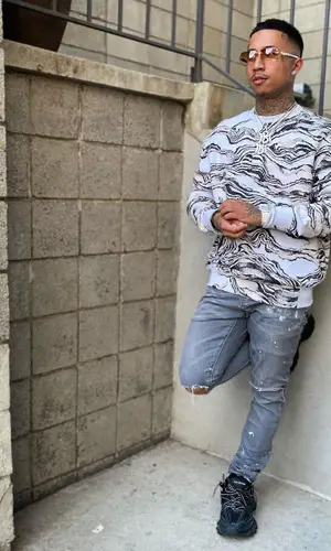 MBNel wearing Twenty Montreal sweater