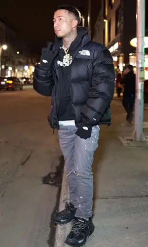 MBNel wearing The North Face jacket