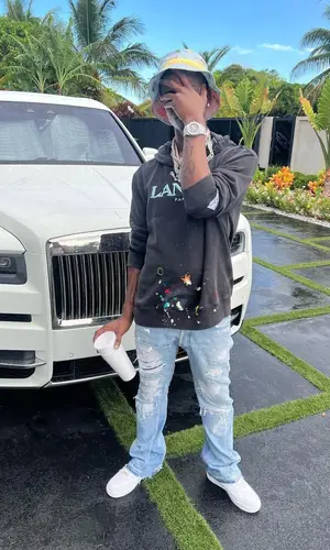 Lil Double 0 wearing Gallery Dept. jeans