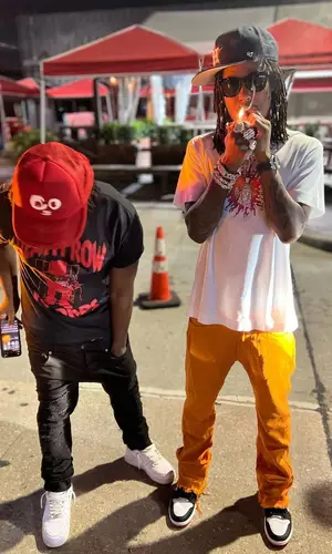 Rich The Kid wearing ’47 cap