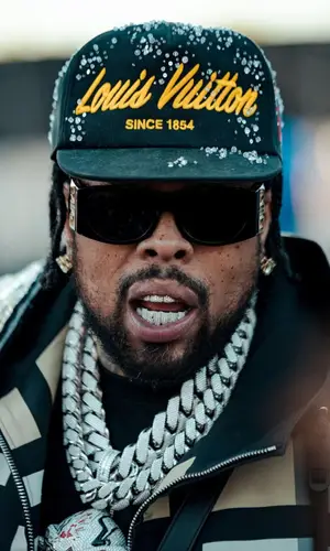 Westside Gunn wearing Louis Vuitton cap