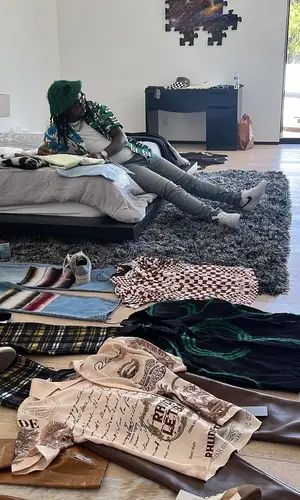 Babyface Ray wearing Amiri jeans
