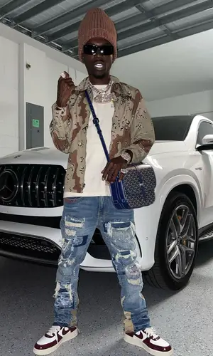 Bobby Fishscale wearing Balenciaga eyewear