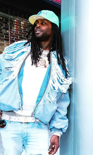 Chief Keef wearing Louis Vuitton belt