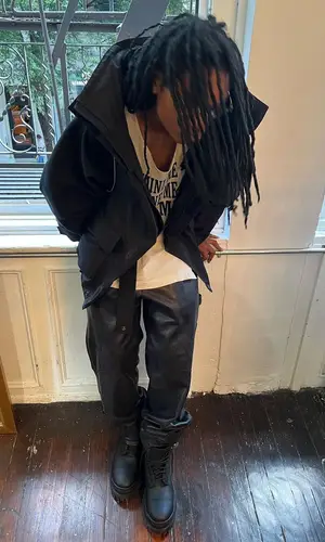Tana wearing Chrome Hearts pants