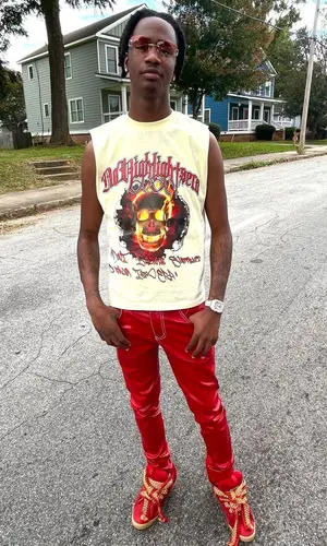 Yung Mal wearing Filthy Wealth jeans