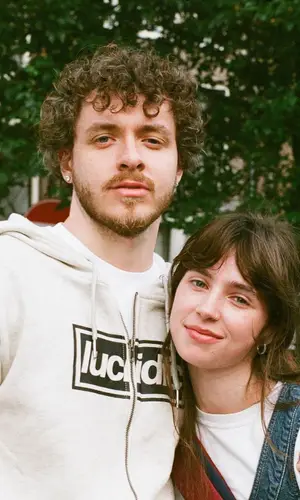 Jack Harlow’s Outfit in Lucid FC Hoodie, Stone Island Pants & New Balance Sneakers (2022)