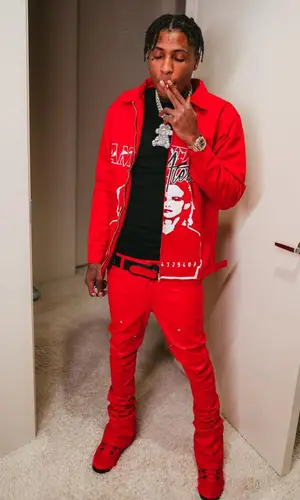 NBA YoungBoy wearing Christian Louboutin belt