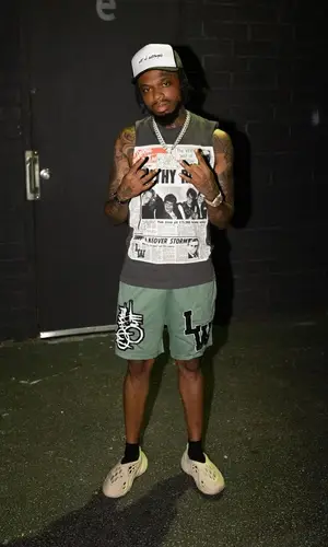 DJ Bandz wearing Yeezy sneakers