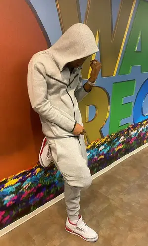 Sha EK wearing Nike pants