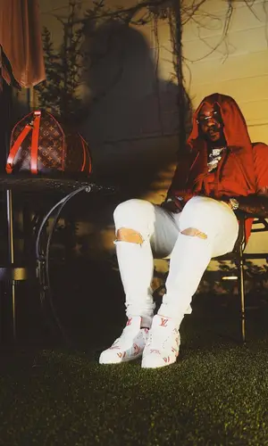 Money Man wearing Louis Vuitton t-shirt