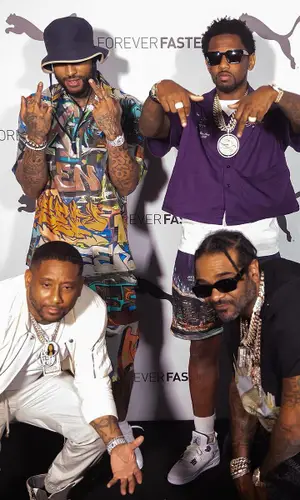 Dave East wearing Off-White shorts