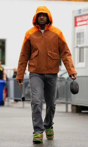 Stefon Diggs wearing Louis Vuitton jacket