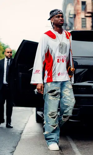 Shai wearing Louis Vuitton bag